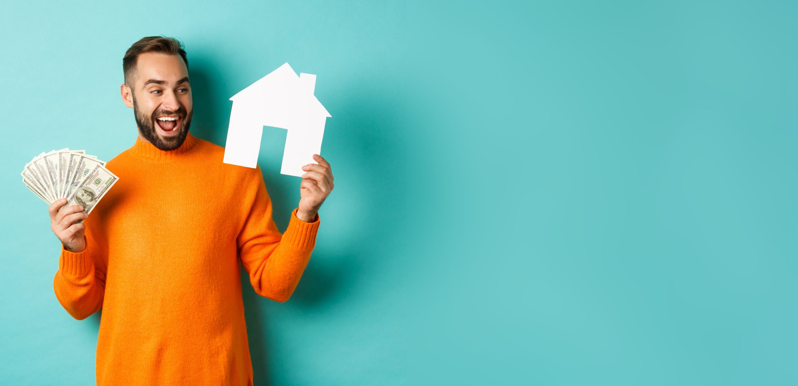 Kredyt hipoteczny 6 real estate concept mortgage concept cheerful man holding money paper house smiling excited scaled